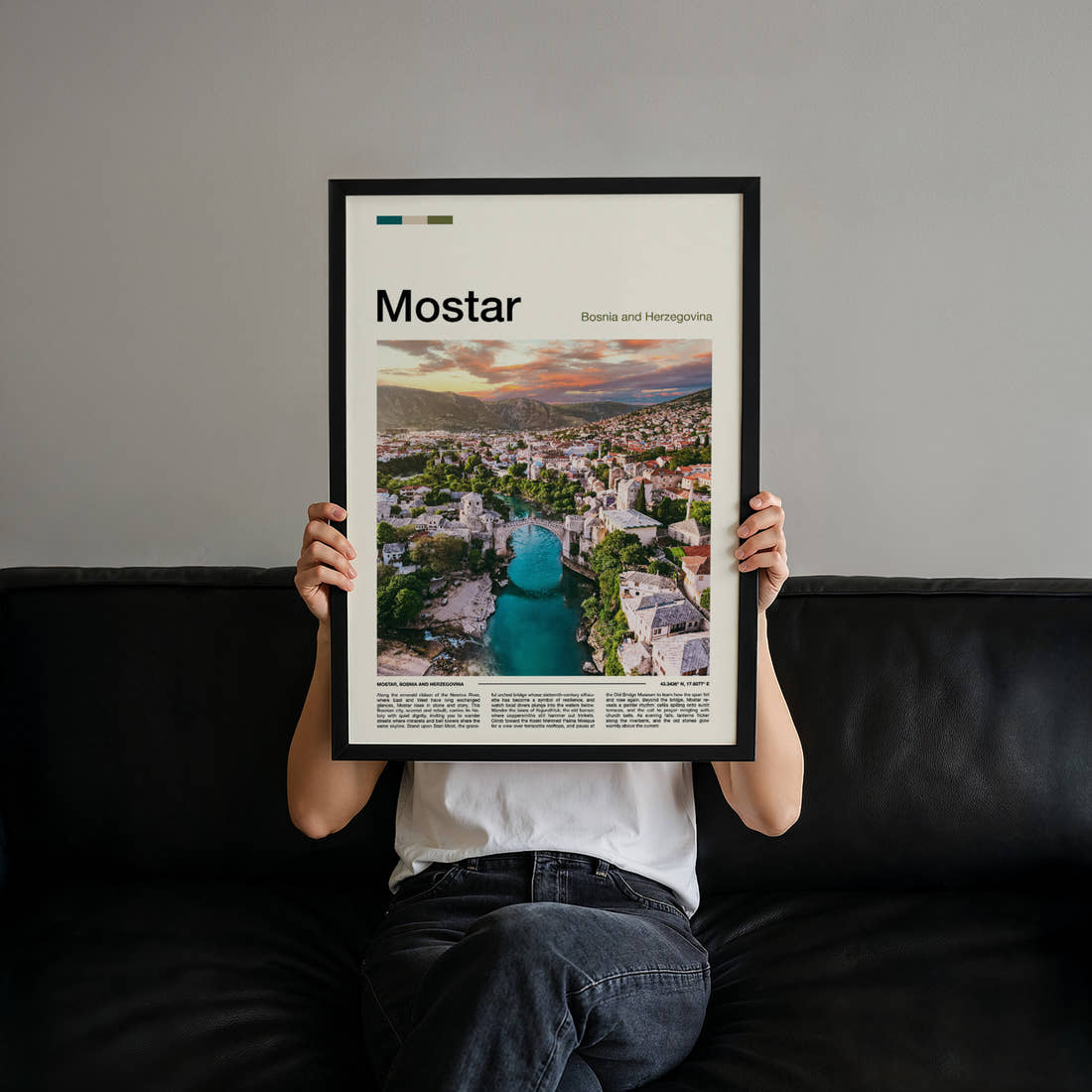 Mostar Old Bridge Aerial View Travel Print held up by hand to show the size of the print