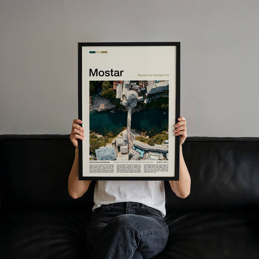 Mostar Old Bridge From Above Travel Print held up by hand to show the size of the print