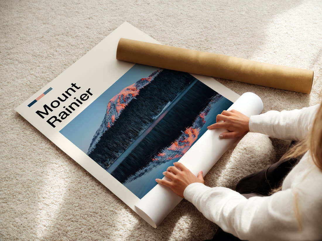 Mount Rainier Mountain Reflected In Lake Travel Print being unrolled from its postal tube