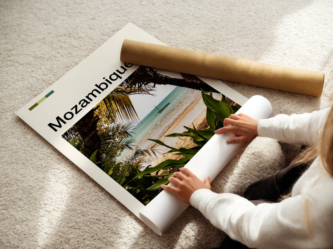 Mozambique Palm Trees On The Beach Travel Print being unrolled from its postal tube