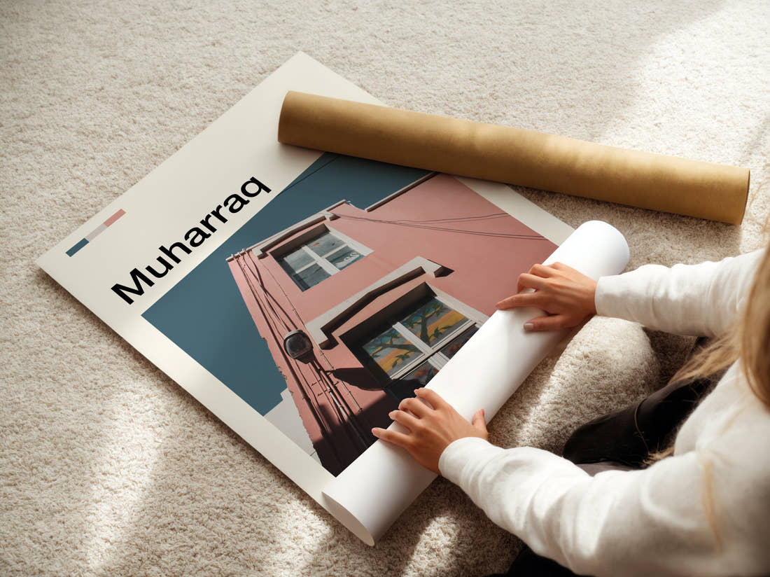 Muharraq Pink Building Corner Travel Print being unrolled from its postal tube