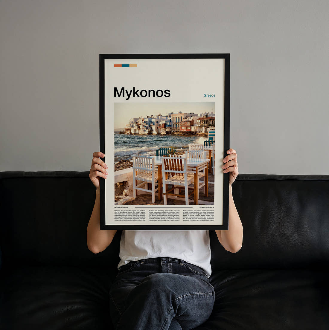 Mykonos Seaside Tables And Chairs Travel Print held up by hand to show the size of the print