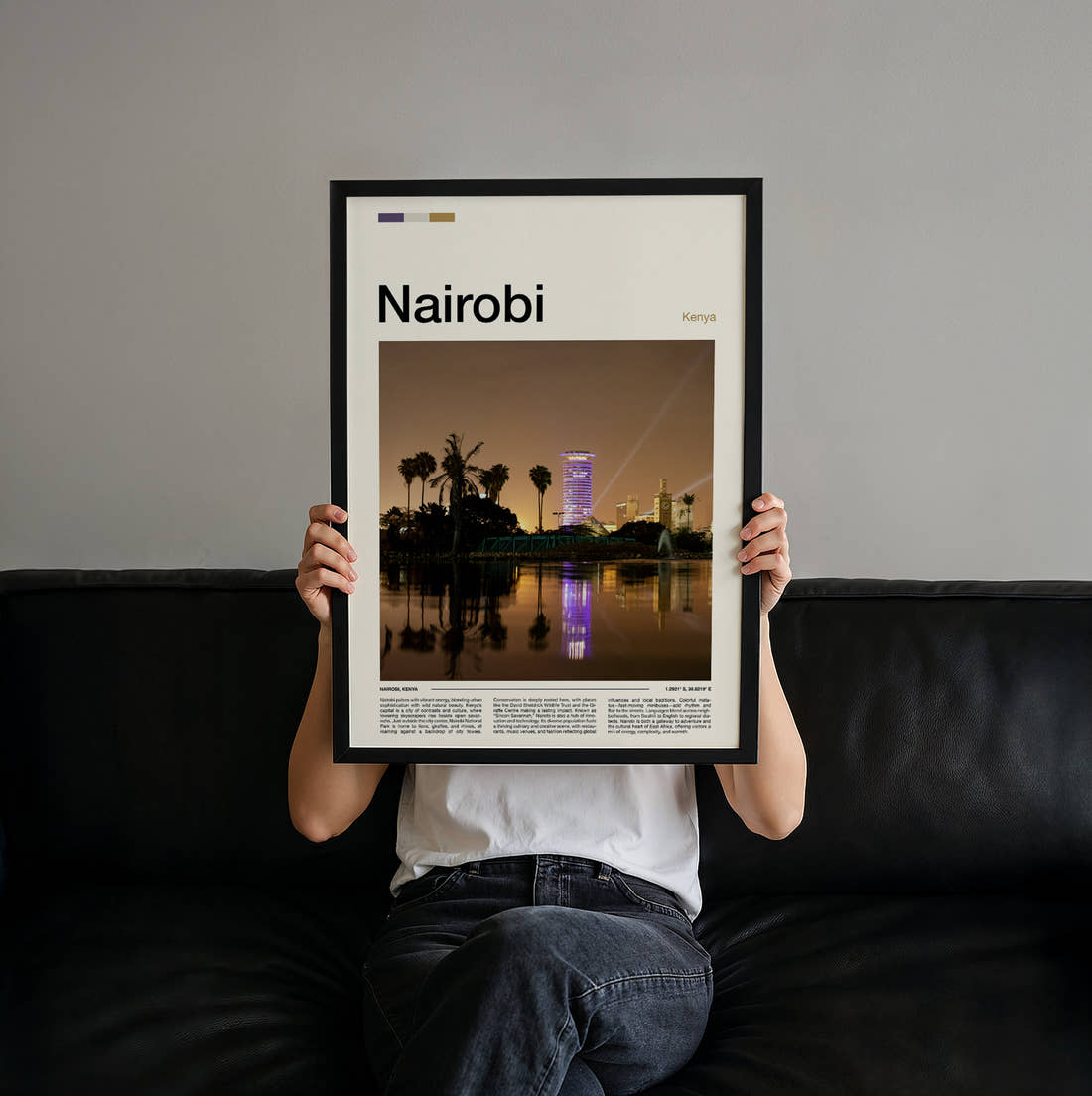 Nairobi Night Skyline Travel Print held up by hand to show the size of the print
