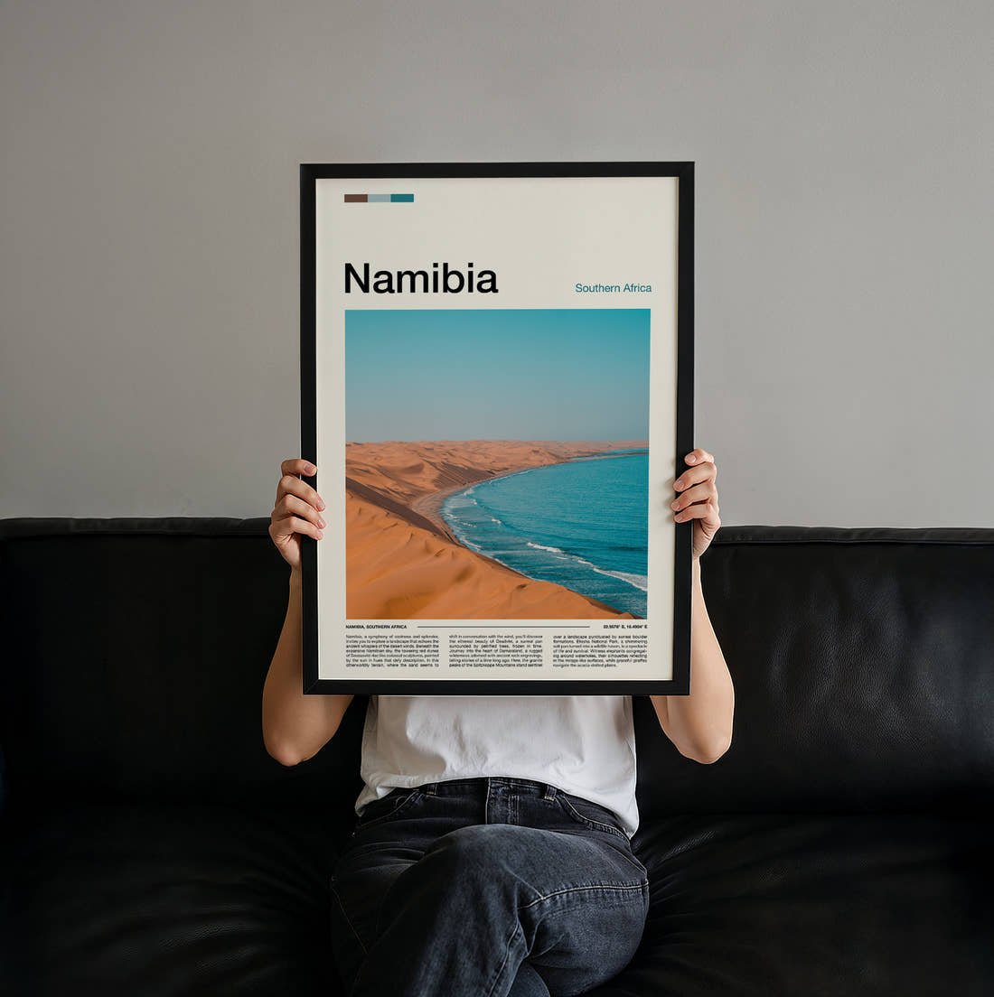 Namibia Dunes Meeting The Sea Travel Print held up by hand to show the size of the print