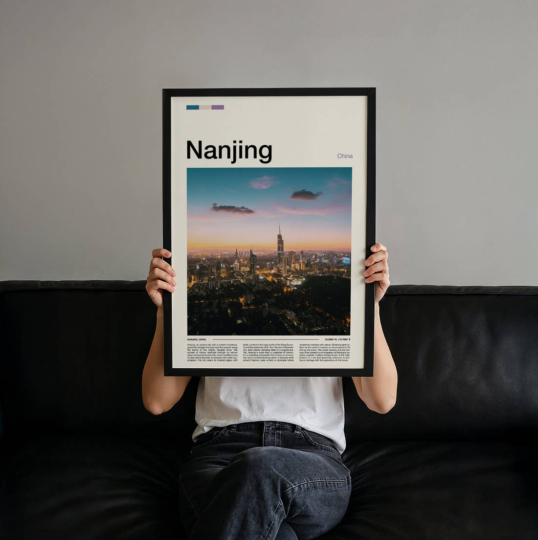 Nanjing Skyline At Sunset Travel Print held up by hand to show the size of the print