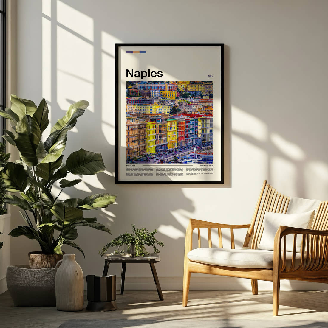 Naples Colourful Buildings Travel Print framed on a pale wall beside houseplants