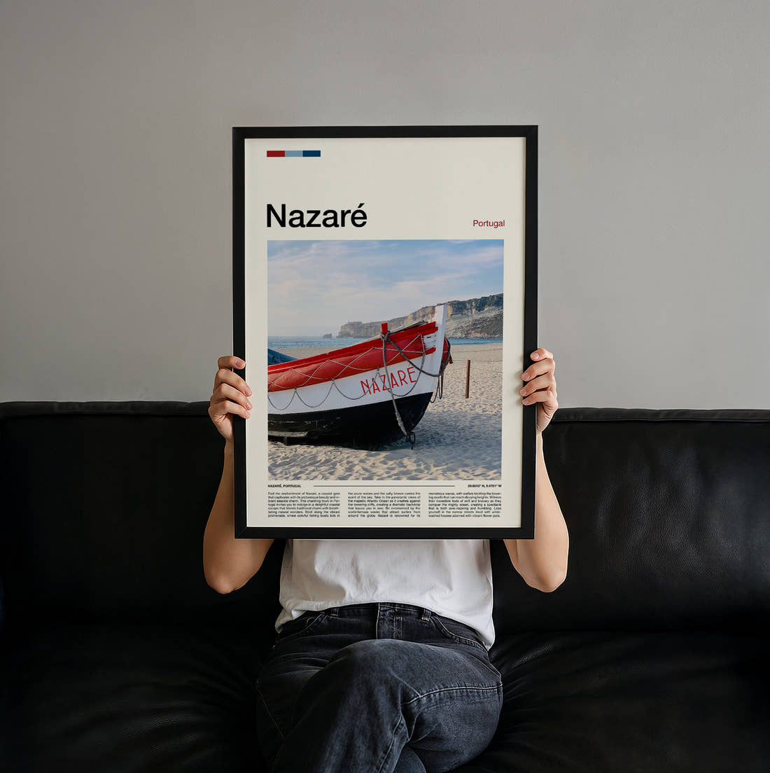 Nazare Red Boat On The Beach Travel Print held up by hand to show the size of the print