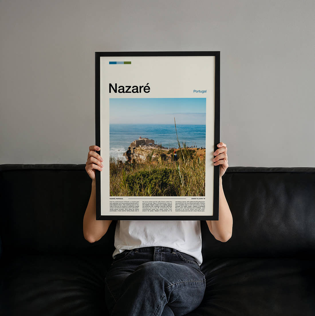 Nazare Clifftop Lighthouse Fort Travel Print held up by hand to show the size of the print