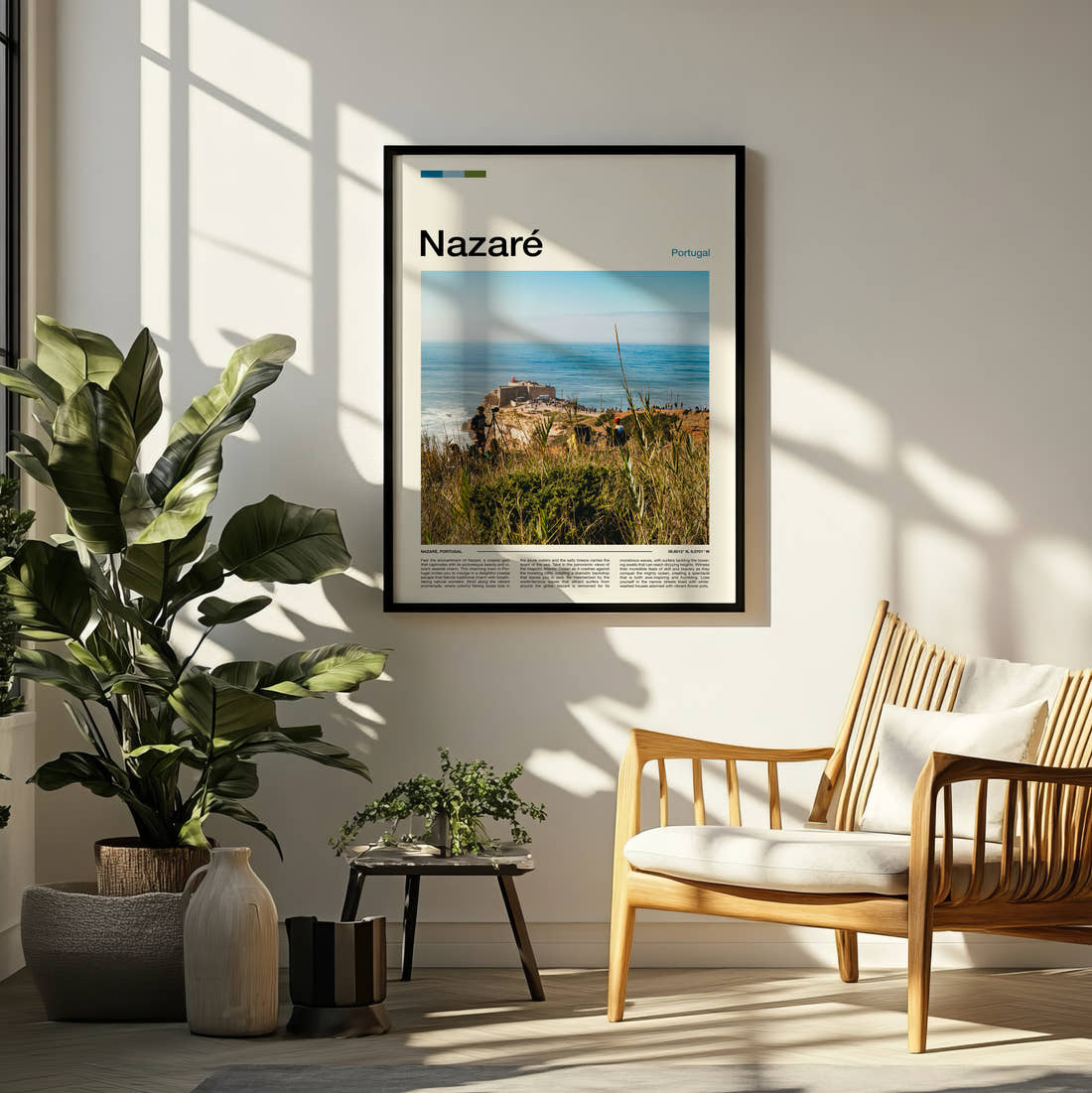 Nazare Clifftop Lighthouse Fort Travel Print framed on a pale wall beside houseplants