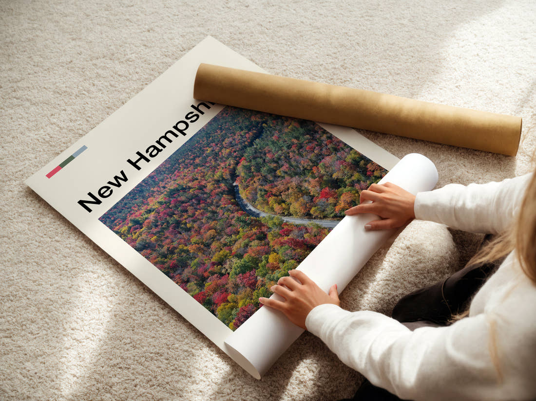 New Hampshire Road Through Autumn Forest Travel Print being unrolled from its postal tube