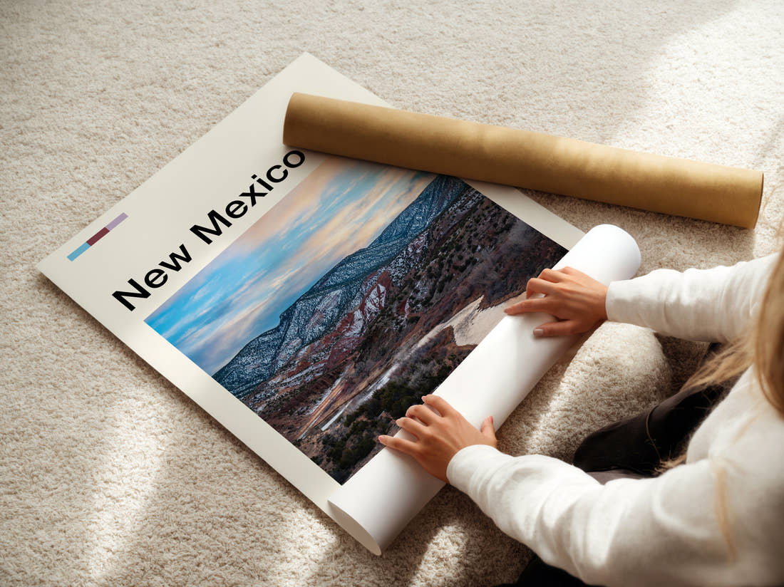 New Mexico River Through Snowy Hills Travel Print being unrolled from its postal tube