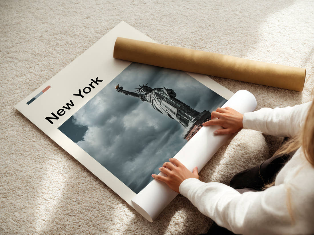 New York Statue Of Liberty Against Storm Clouds Travel Print being unrolled from its postal tube
