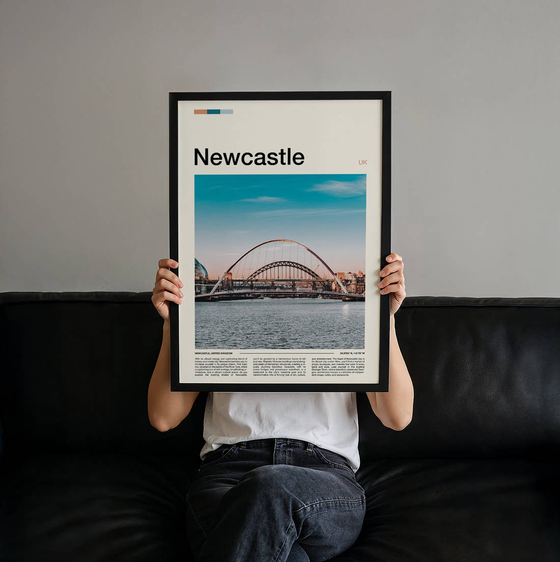 Newcastle Gateshead Millennium Bridge Travel Print held up by hand to show the size of the print
