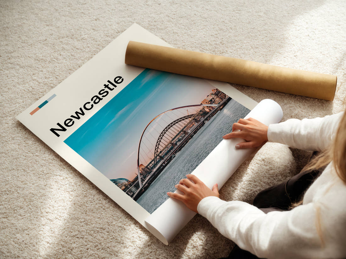 Newcastle Gateshead Millennium Bridge Travel Print being unrolled from its postal tube