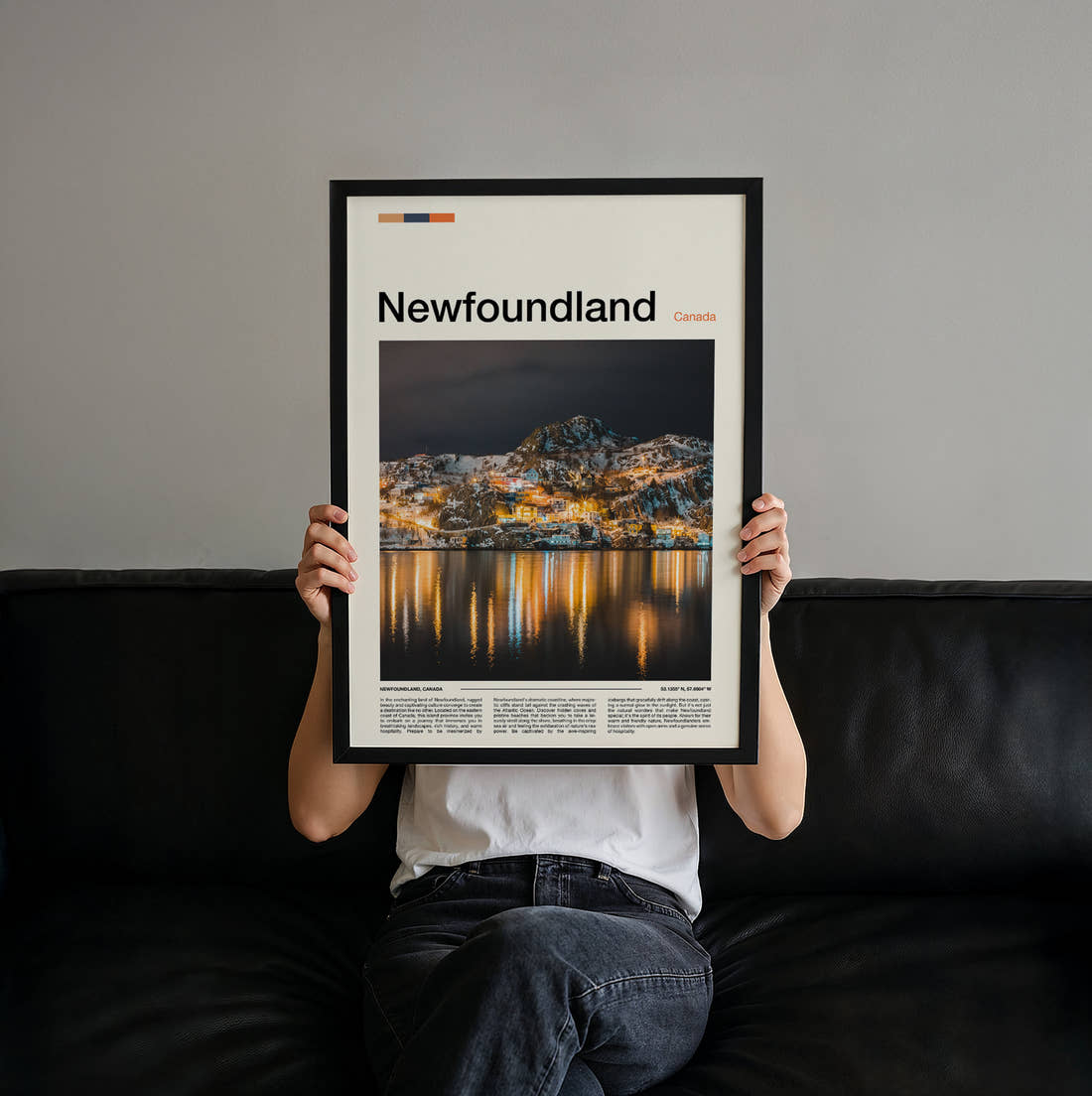Newfoundland Harbour Town At Night Travel Print held up by hand to show the size of the print