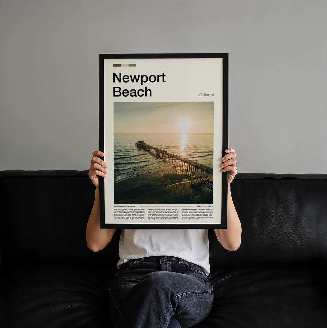 Newport Beach Pier At Sunset Travel Print held up by hand to show the size of the print