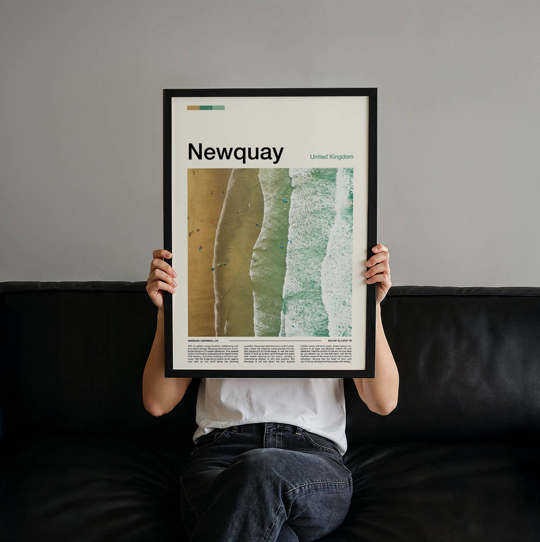 Newquay Aerial View Of The Beach Travel Print held up by hand to show the size of the print
