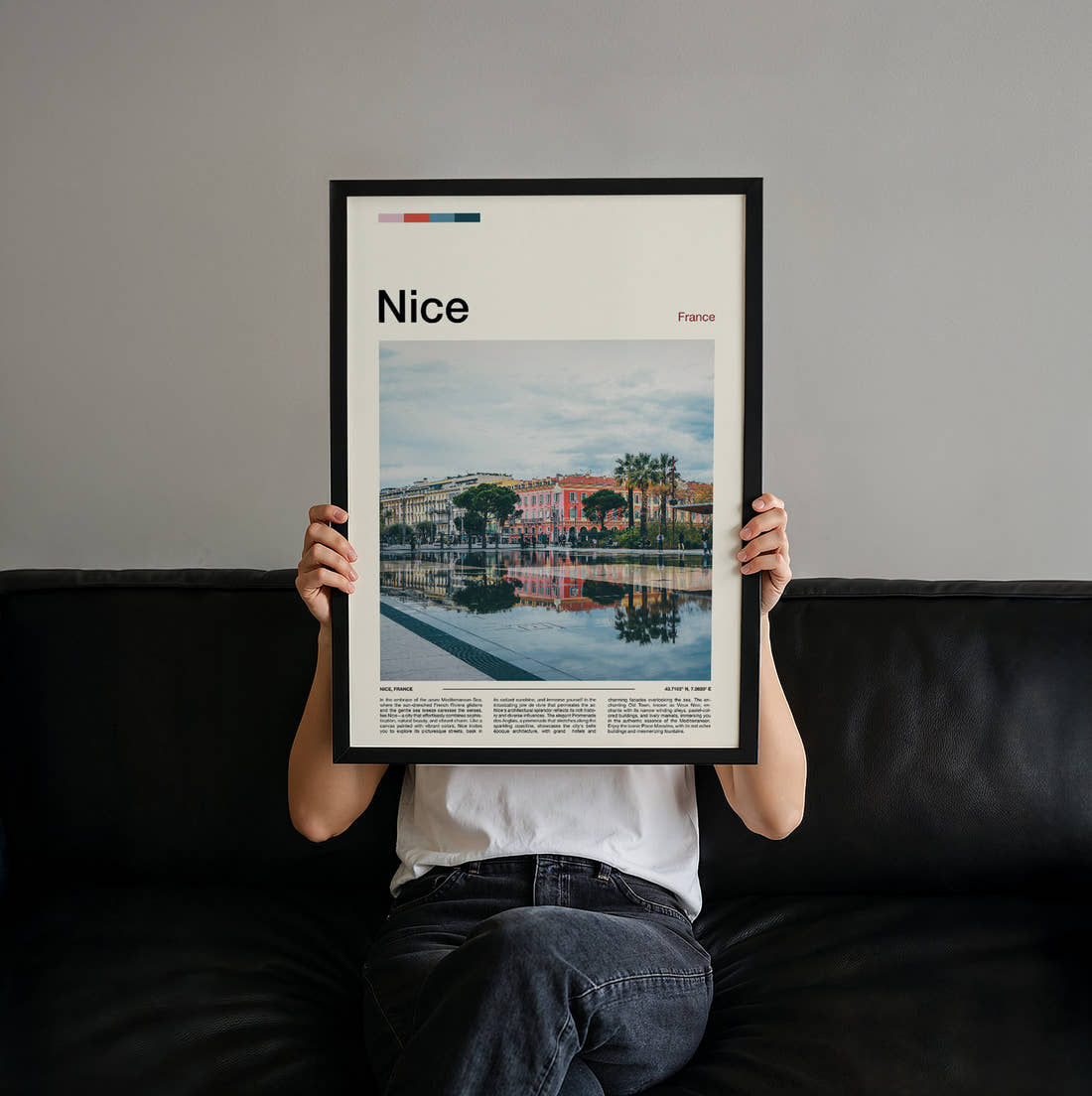 Nice Buildings Reflected In Water Travel Print held up by hand to show the size of the print