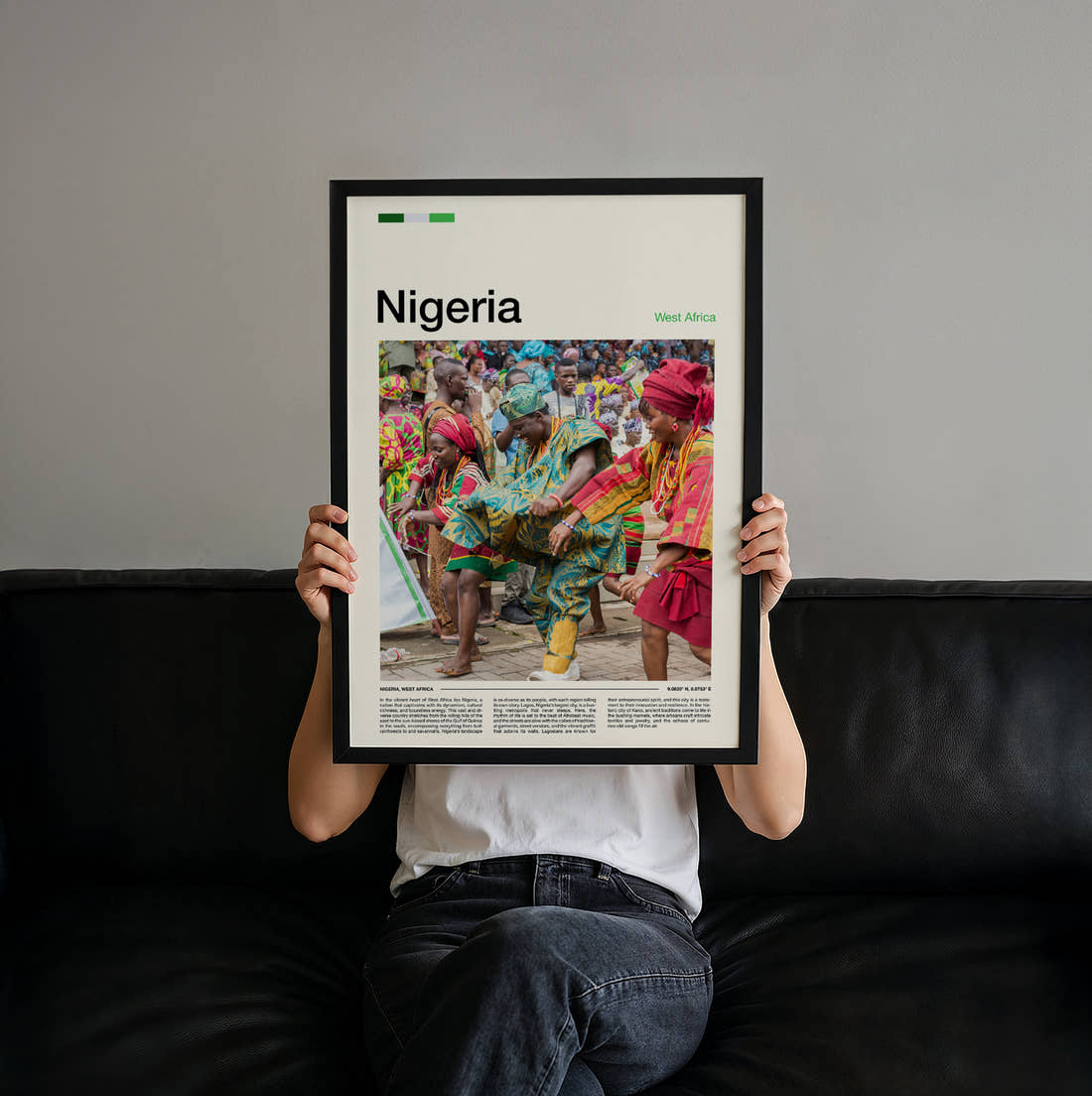 Nigeria Dancers In Colourful Dress Travel Print held up by hand to show the size of the print