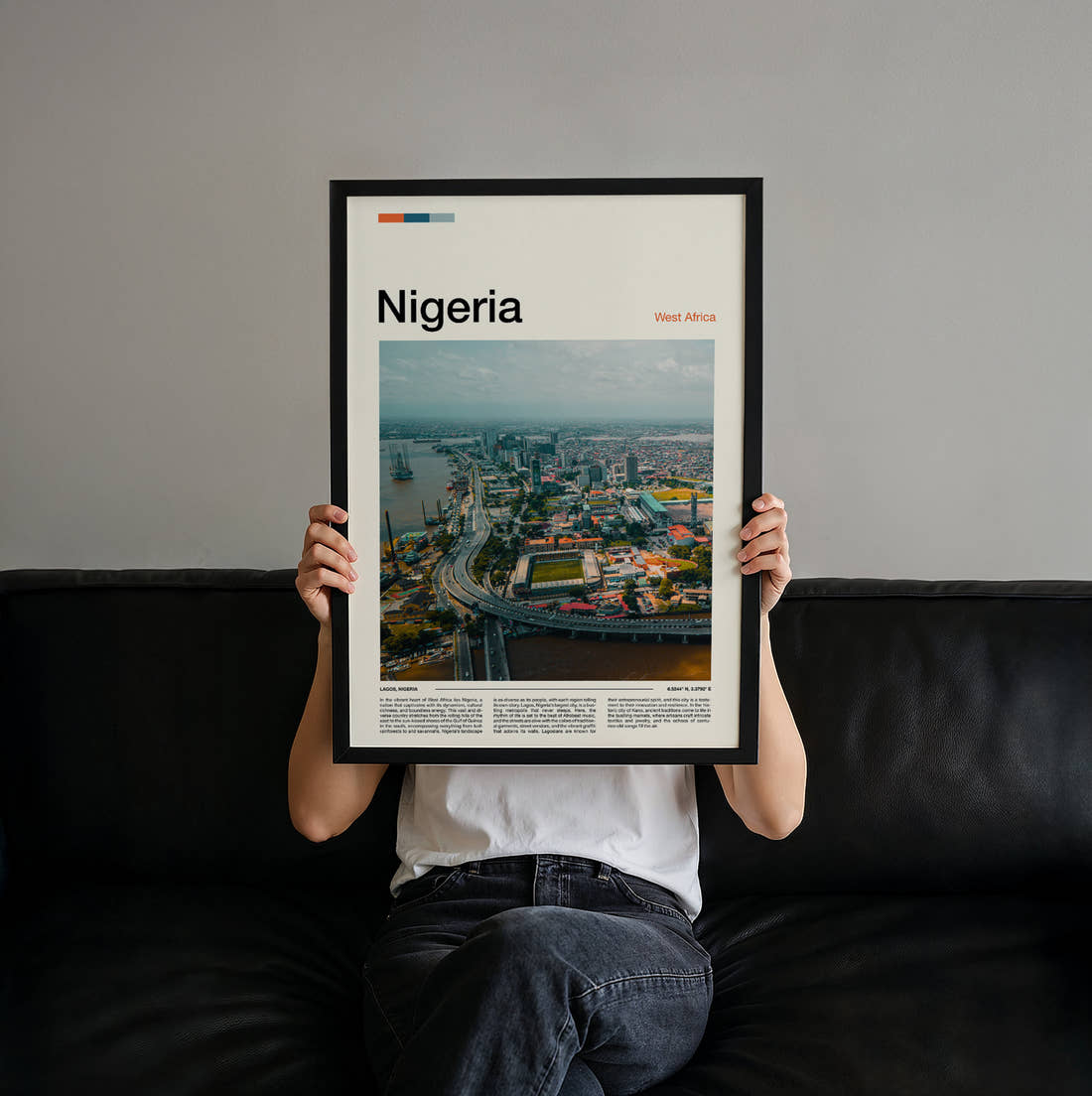 Nigeria City Skyline From Above Travel Print held up by hand to show the size of the print