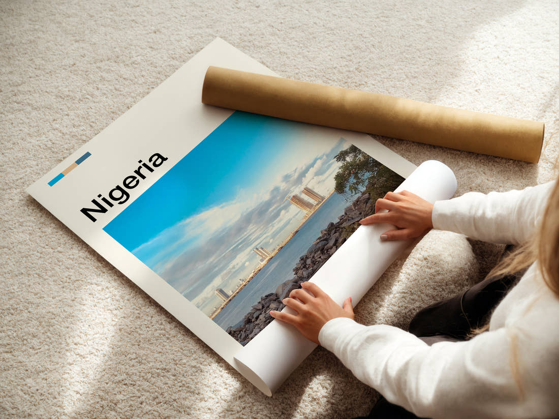 Nigeria Rocky Shoreline And Skyline Travel Print being unrolled from its postal tube