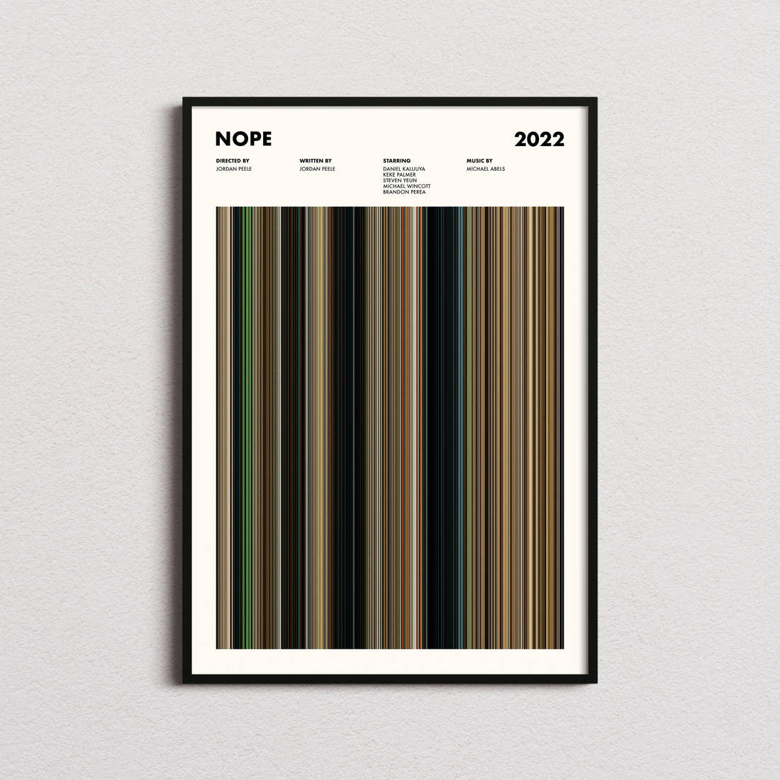 Nope Movie Barcode Poster framed on a plain studio wall