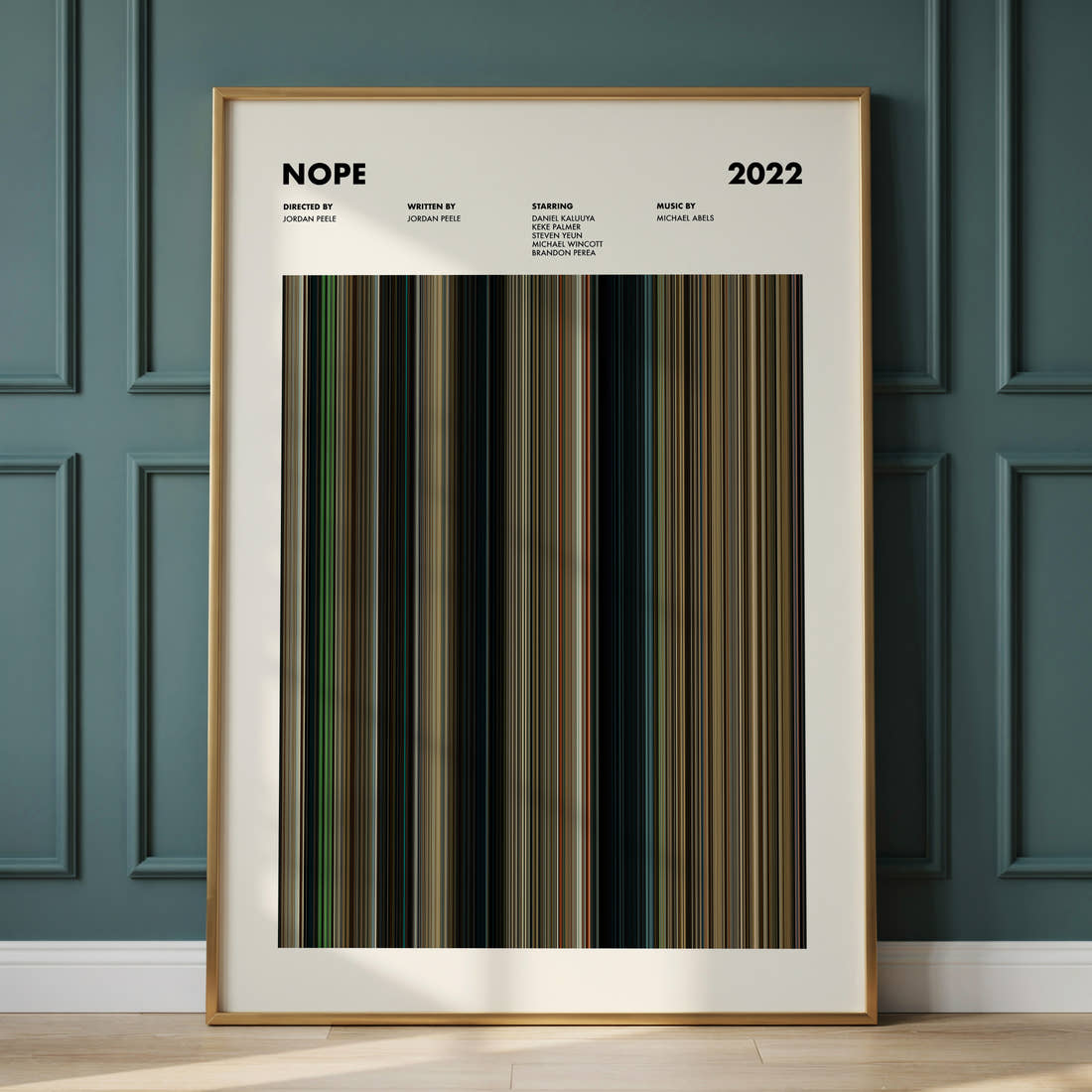 Nope Movie Barcode Poster framed and leaning against a panelled wall