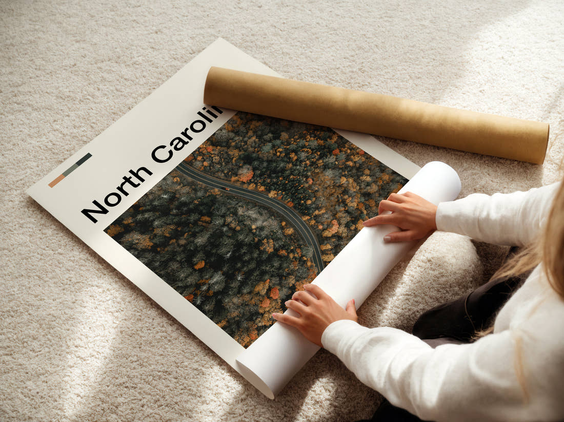 North Carolina Road Through Autumn Forest Travel Print being unrolled from its postal tube