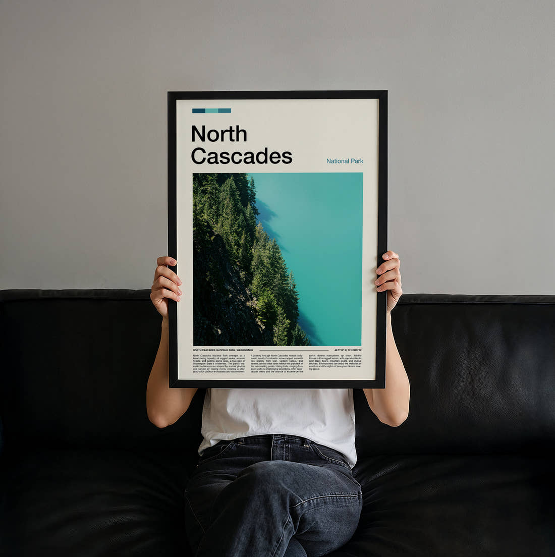 North Cascades Turquoise Lake And Forest Travel Print held up by hand to show the size of the print