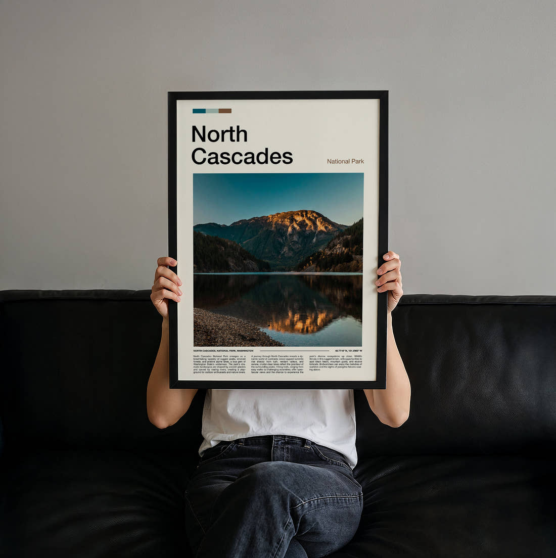 North Cascades Mountain Reflected In Lake Travel Print held up by hand to show the size of the print