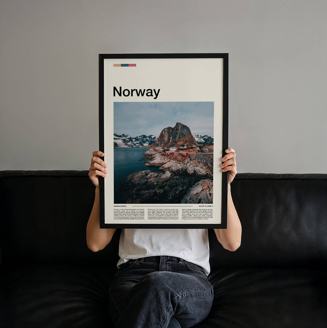 Norway Red Fishing Cabins Travel Print held up by hand to show the size of the print