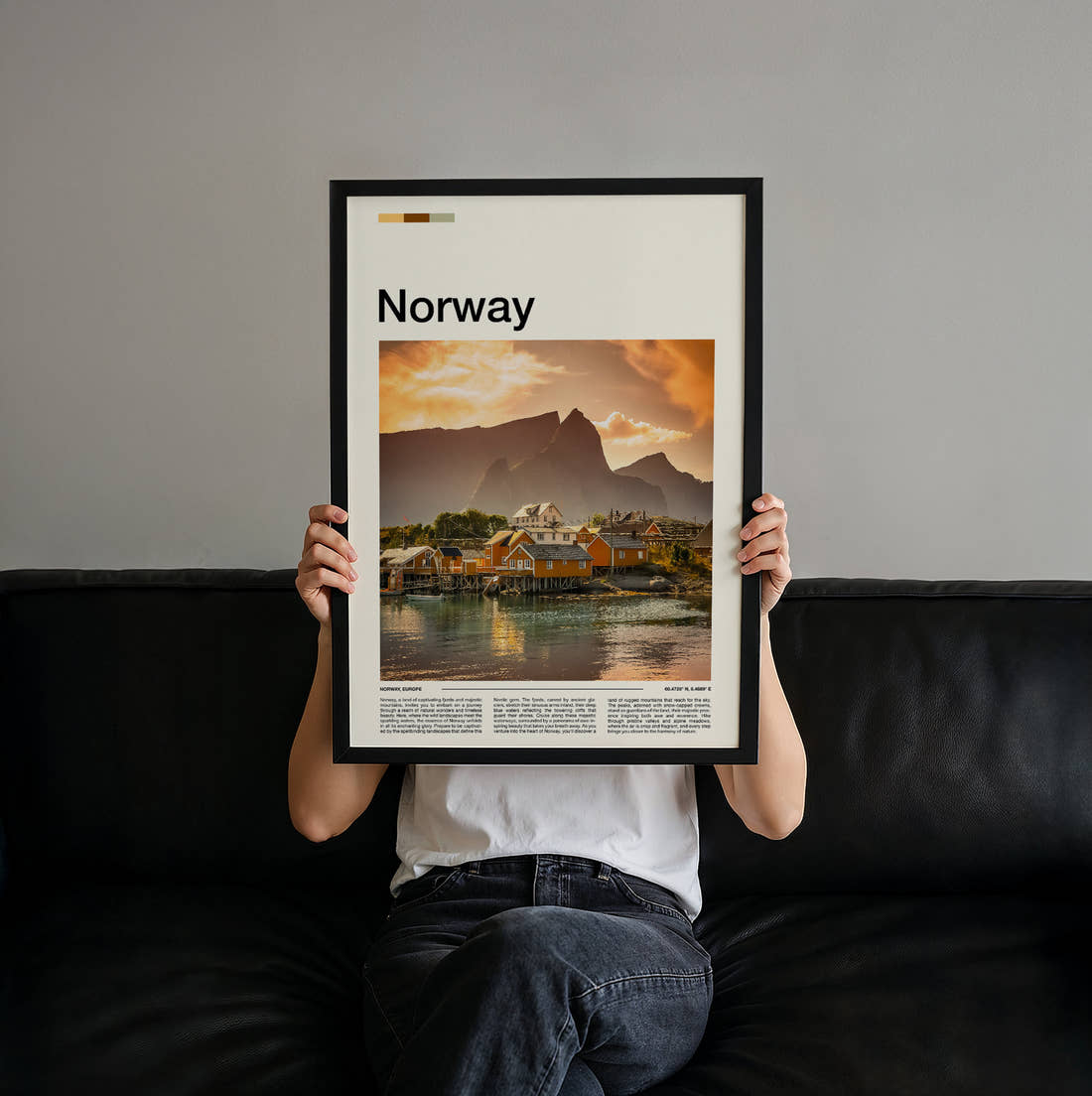 Norway Waterfront Cabins At Sunset Travel Print held up by hand to show the size of the print