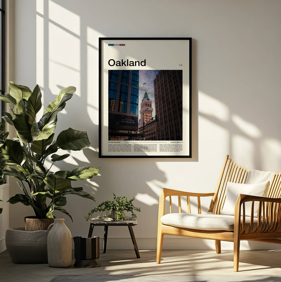 Oakland Tribune Tower Travel Print framed on a pale wall beside houseplants
