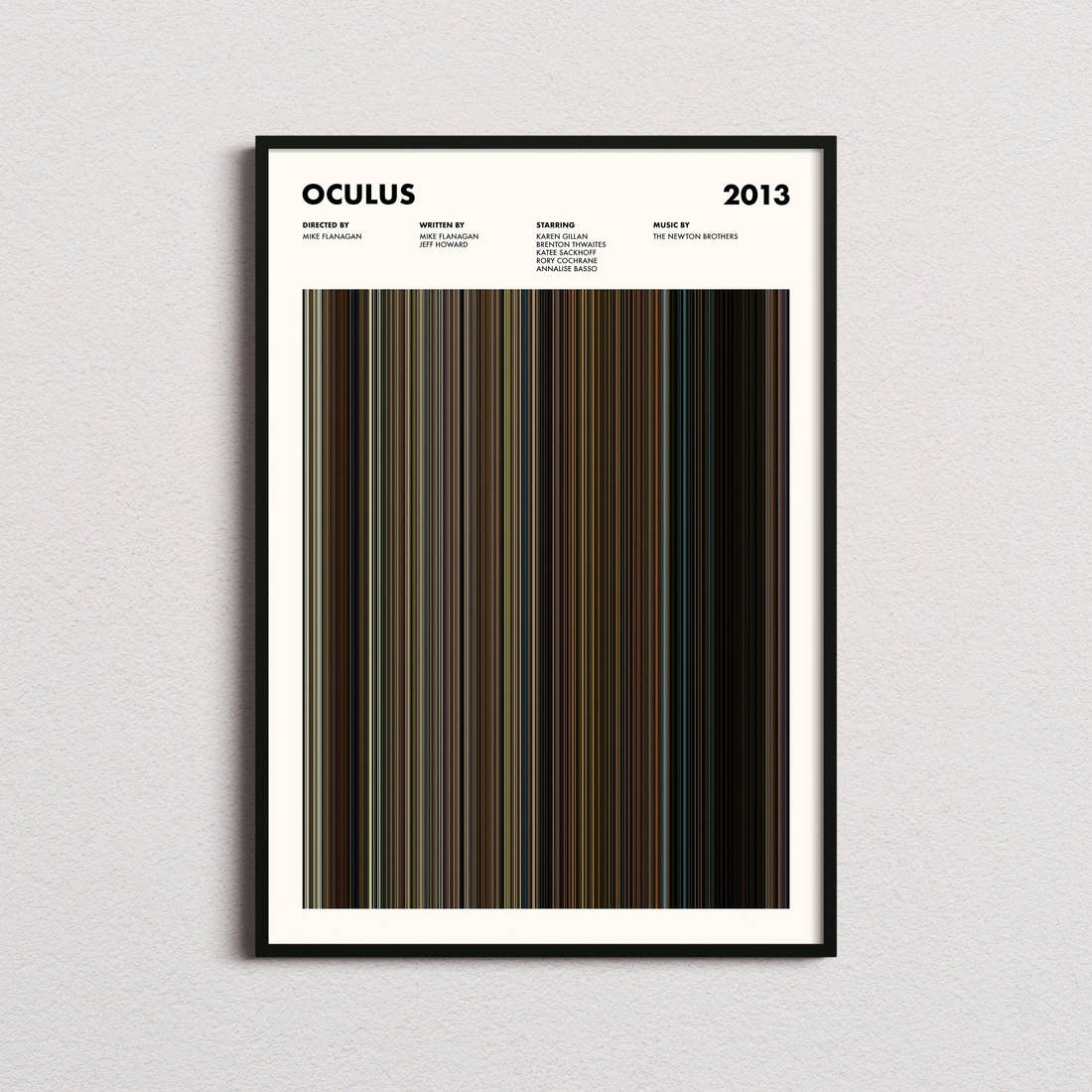 Oculus Movie Barcode Poster framed on a plain studio wall