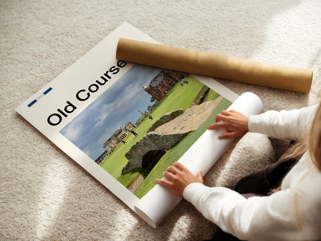 Old Course St Andrews Golf Course Print being unrolled from its postal tube