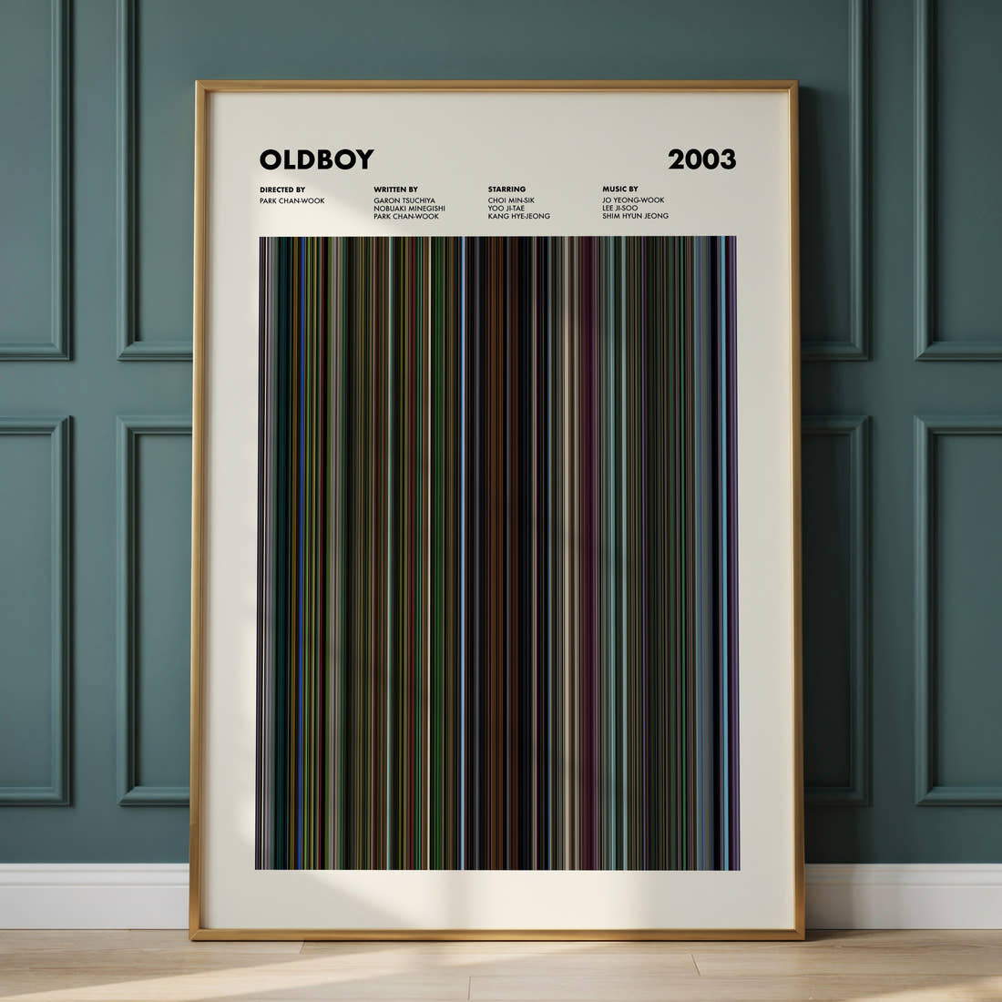 Oldboy 2003 Movie Barcode Poster framed and leaning against a panelled wall