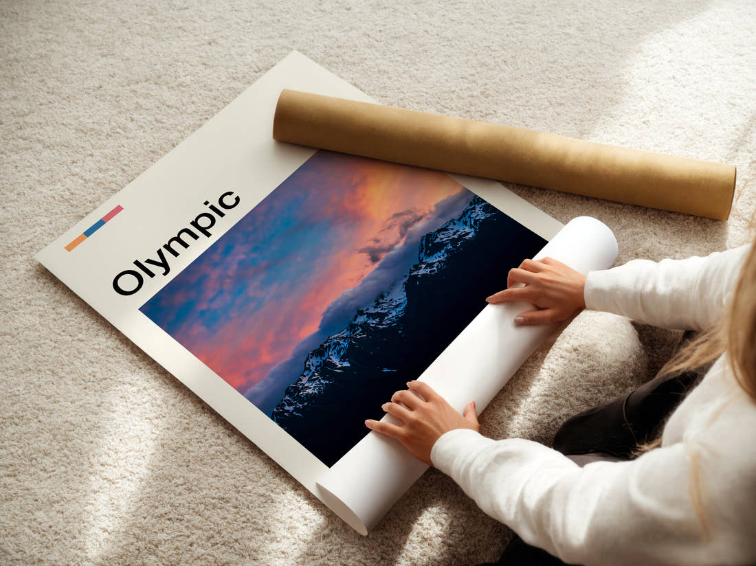 Olympic Snowy Mountains At Dusk Travel Print being unrolled from its postal tube