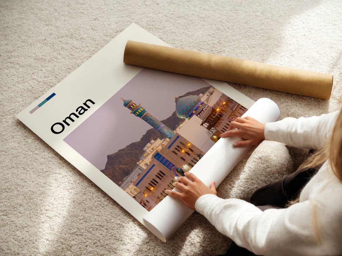Oman Minaret And Blue Dome Travel Print being unrolled from its postal tube