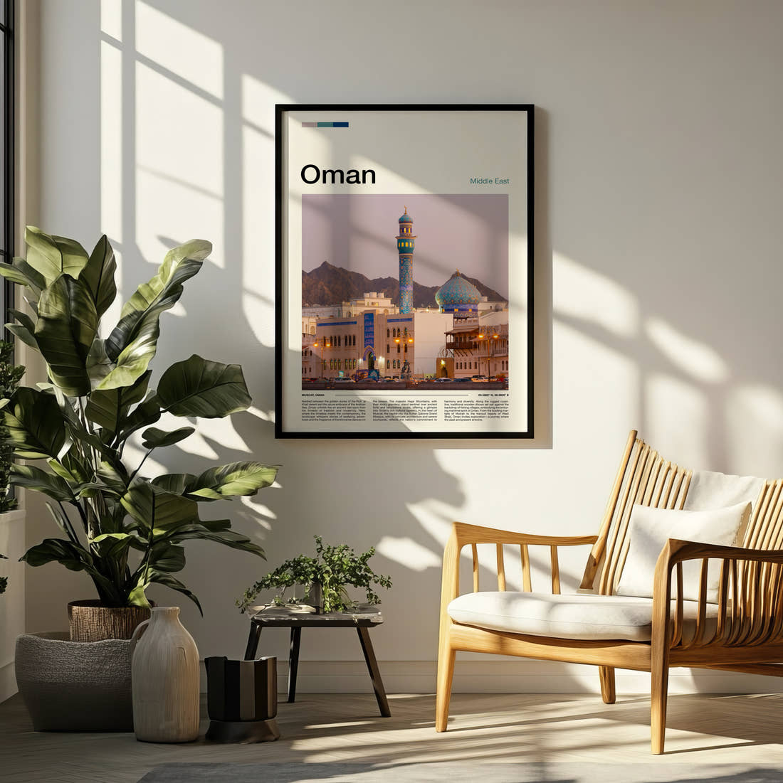 Oman Minaret And Blue Dome Travel Print framed on a pale wall beside houseplants