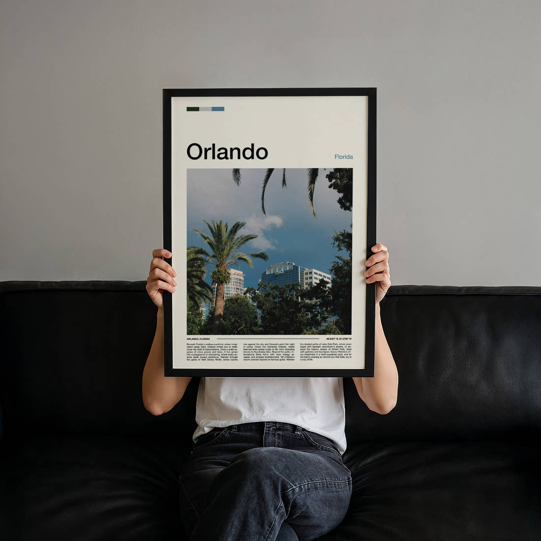 Orlando Skyline Through Palms Travel Print held up by hand to show the size of the print