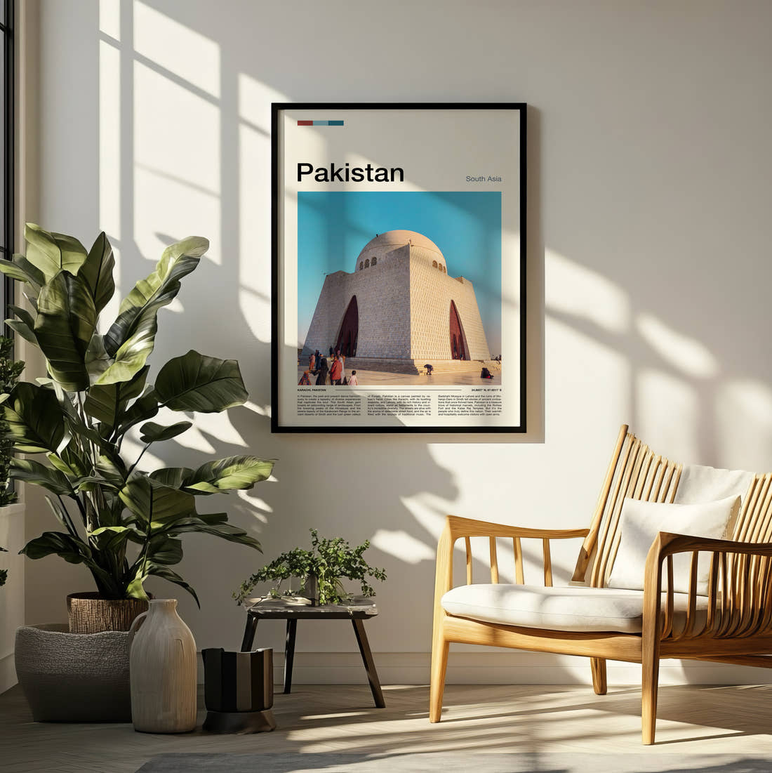 Pakistan Jinnah Mausoleum Travel Print framed on a pale wall beside houseplants