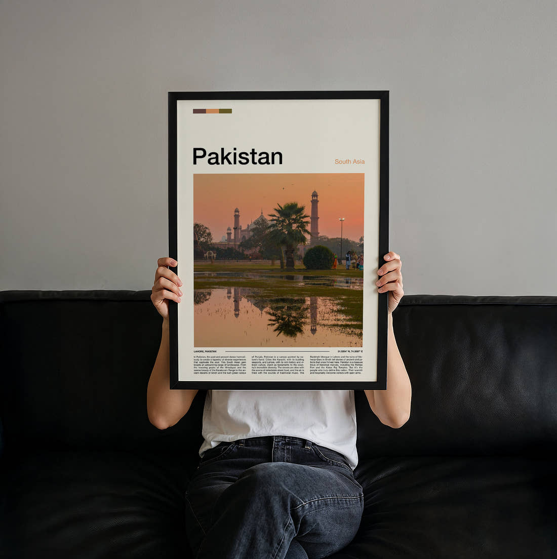 Pakistan Badshahi Mosque At Sunset Travel Print held up by hand to show the size of the print