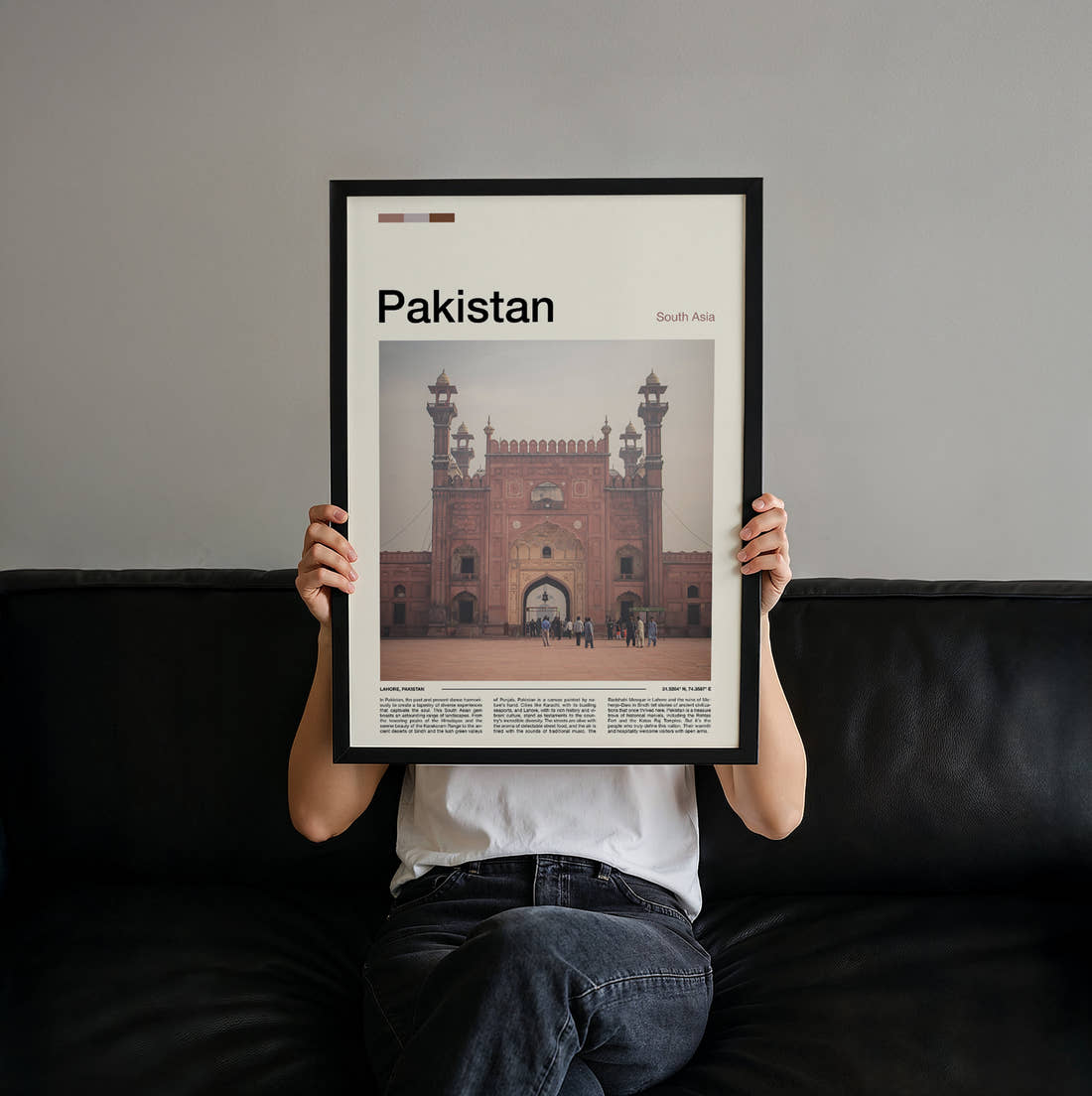 Pakistan Badshahi Mosque Gateway Travel Print held up by hand to show the size of the print