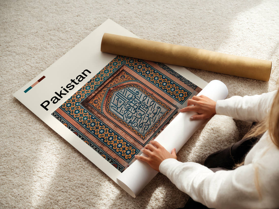 Pakistan Tiled Calligraphy Panel Travel Print being unrolled from its postal tube