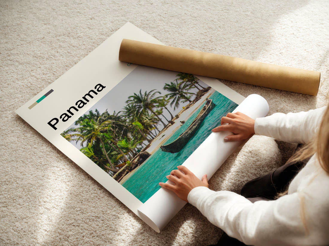 Panama Canoe On Turquoise Water Travel Print being unrolled from its postal tube