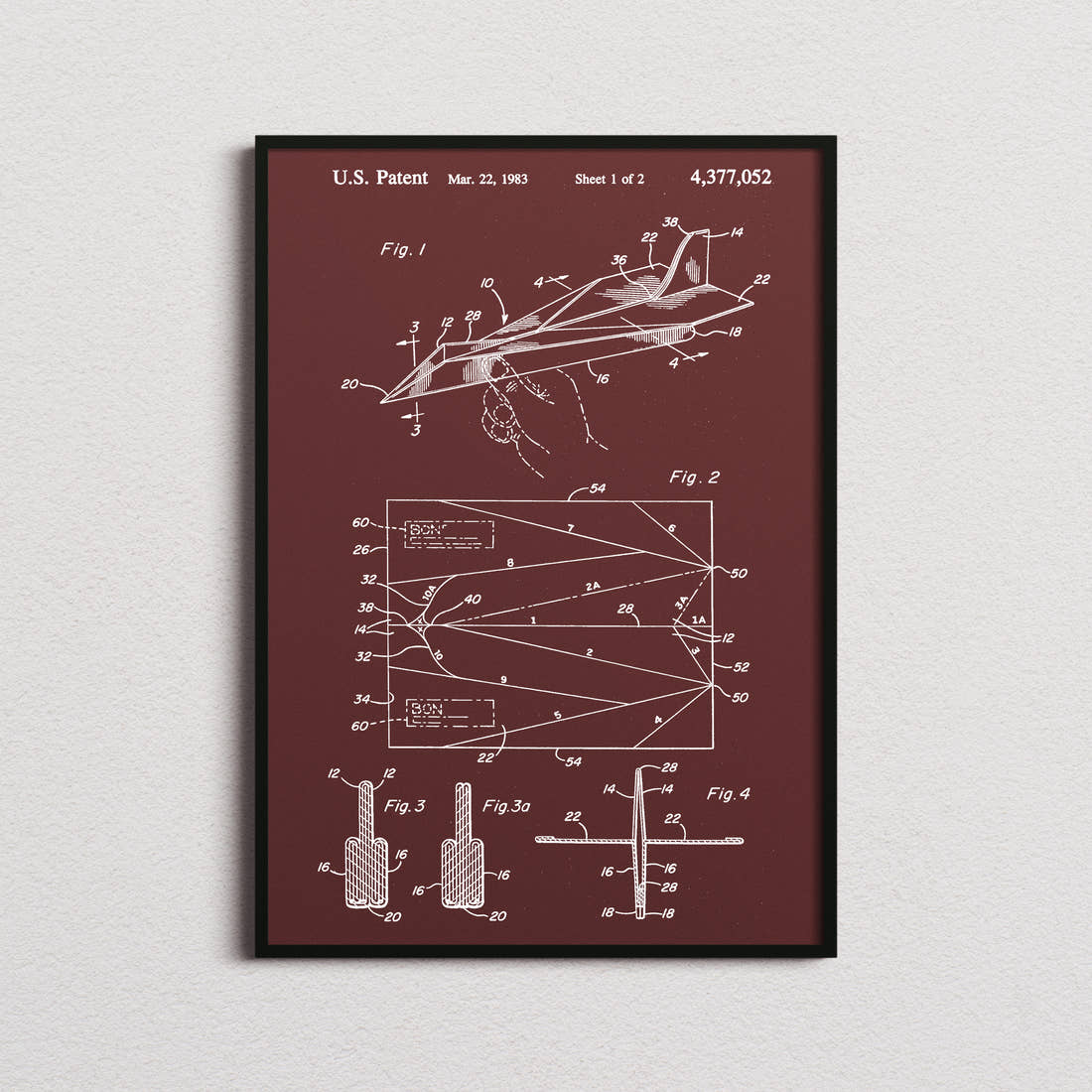 Paper Airplane Patent Print in the burgundy colourway, framed