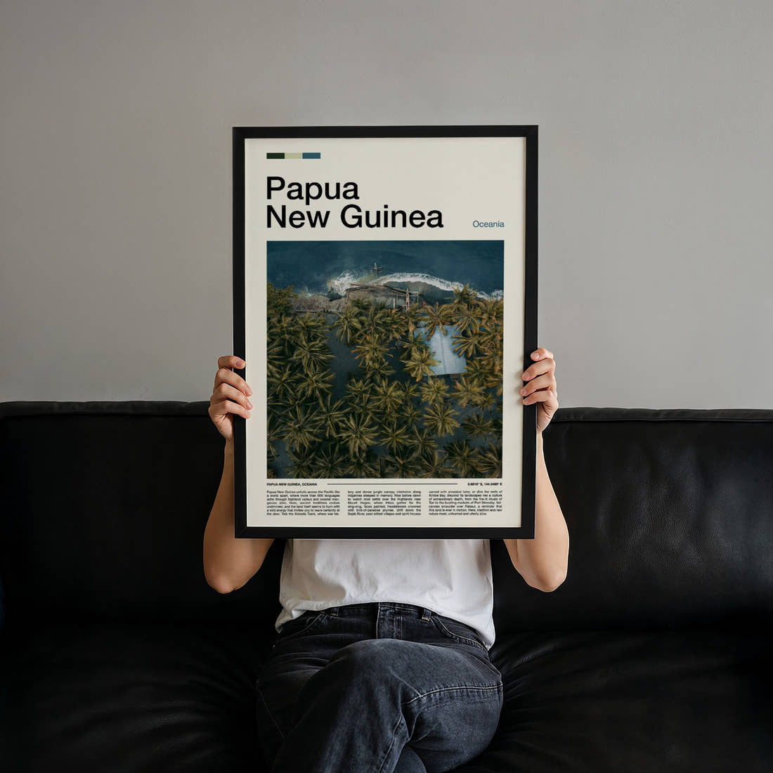 Papua New Guinea Aerial Coastal Village Travel Print held up by hand to show the size of the print