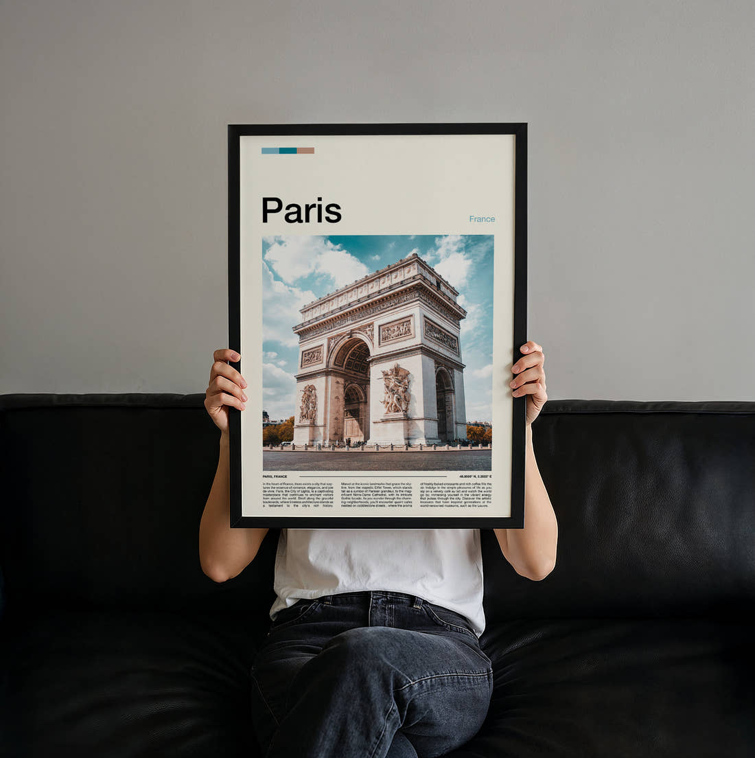 Paris Arc De Triomphe Travel Print held up by hand to show the size of the print