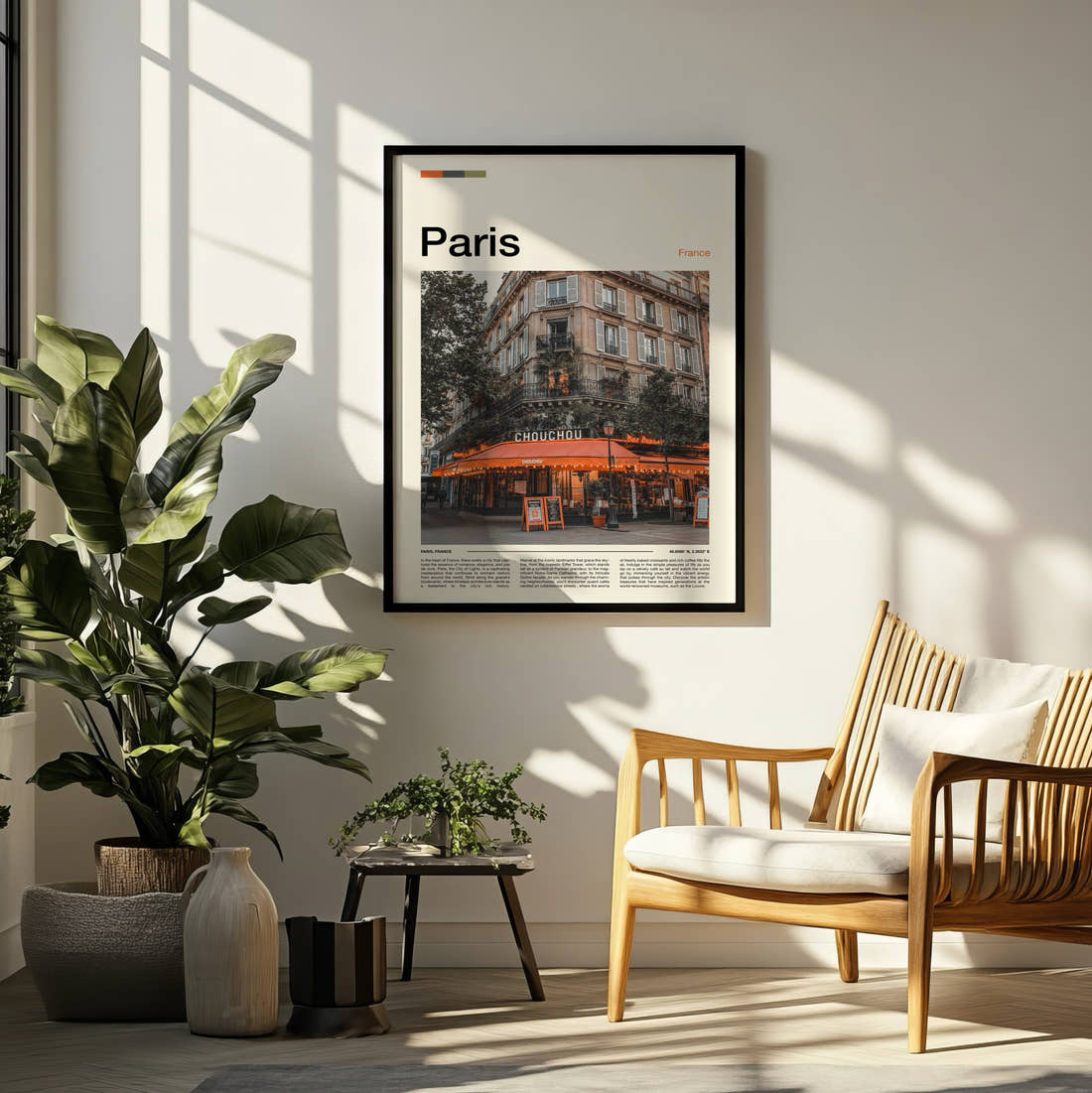 Paris Pavement Cafe Travel Print framed on a pale wall beside houseplants