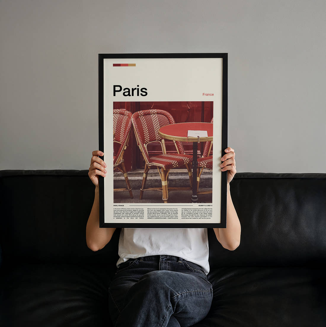 Paris Bistro Chairs Travel Print held up by hand to show the size of the print